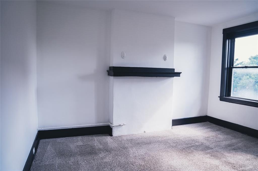 620 Kirkpatrick Street Pittsburgh, PA 15219 - Photo 5 of 15 an empty room with a window