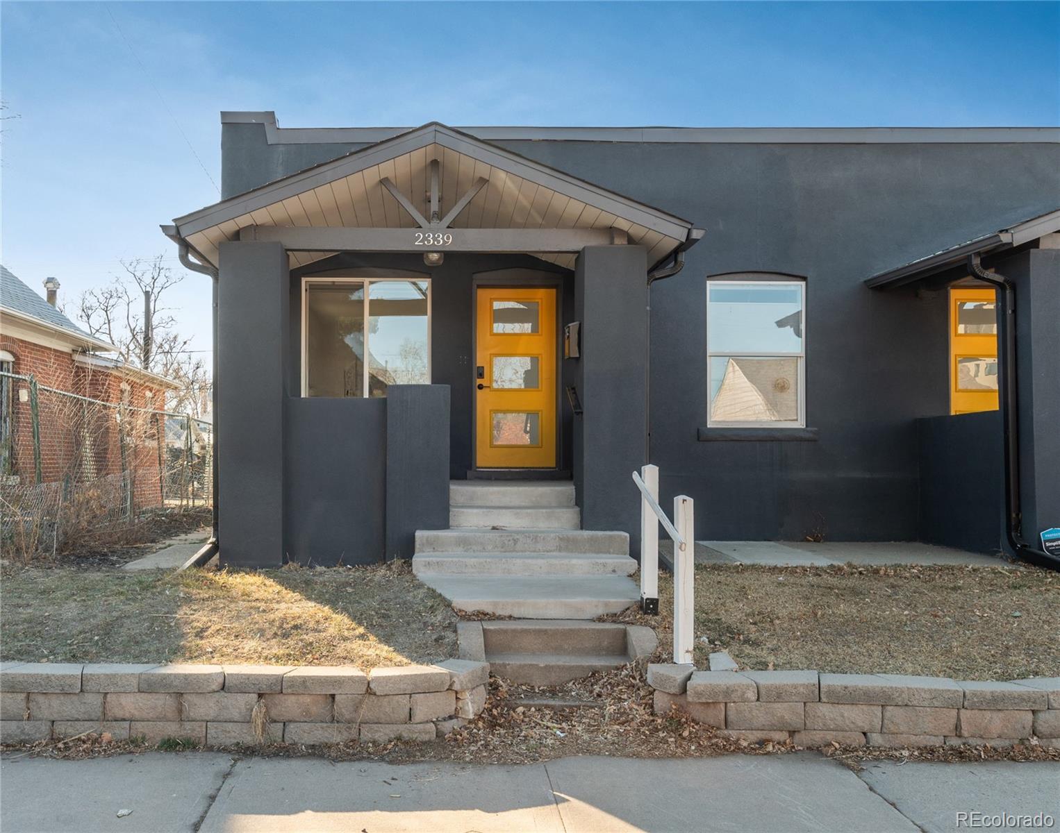 2339 South Acoma Street Denver, CO 80223 - Photo 2 of 36 a front view of a house