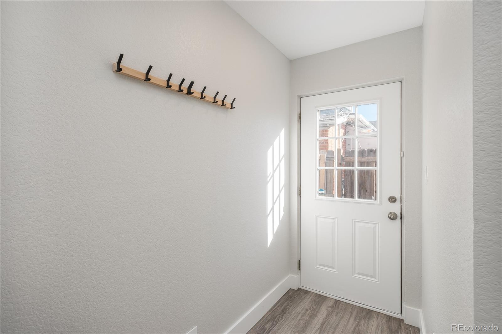 2339 South Acoma Street Denver, CO 80223 - Photo 28 of 36 an empty room with windows