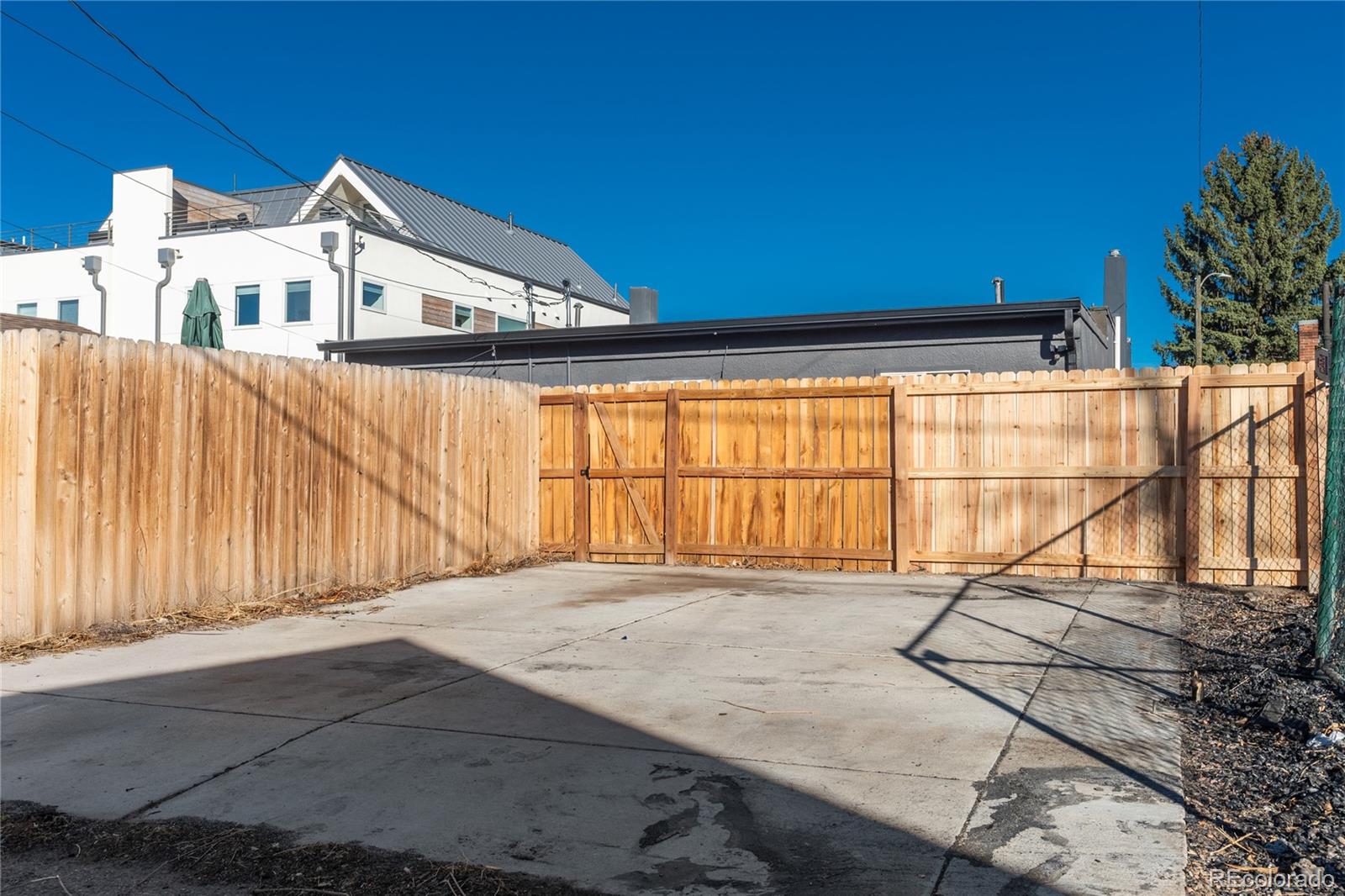 2339 South Acoma Street Denver, CO 80223 - Photo 35 of 36 a view of a house with a outdoor space