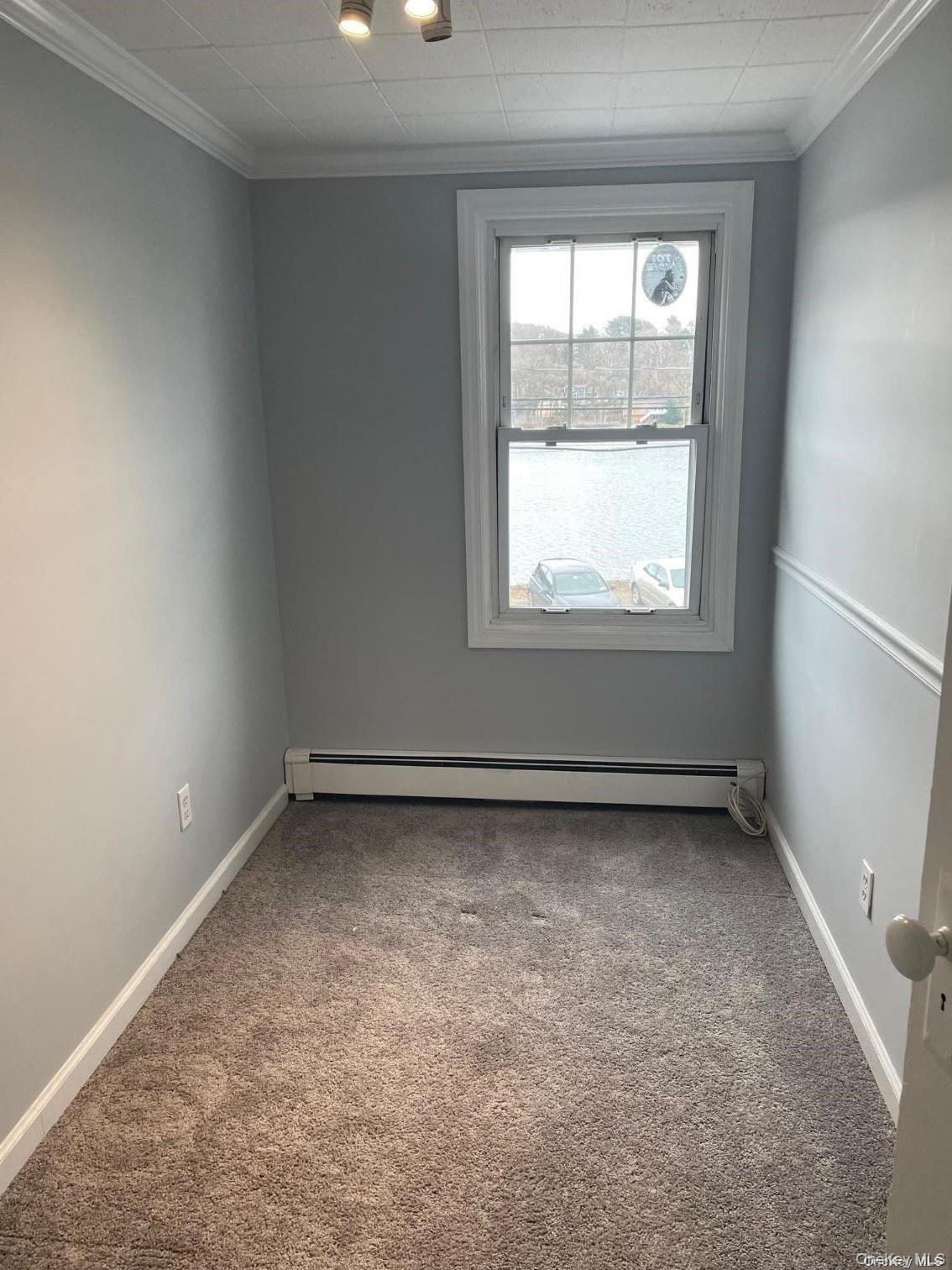 51 Centershore Road, Unit UPPR Centerport, NY 11721 - Photo 12 of 20 an empty room with a window