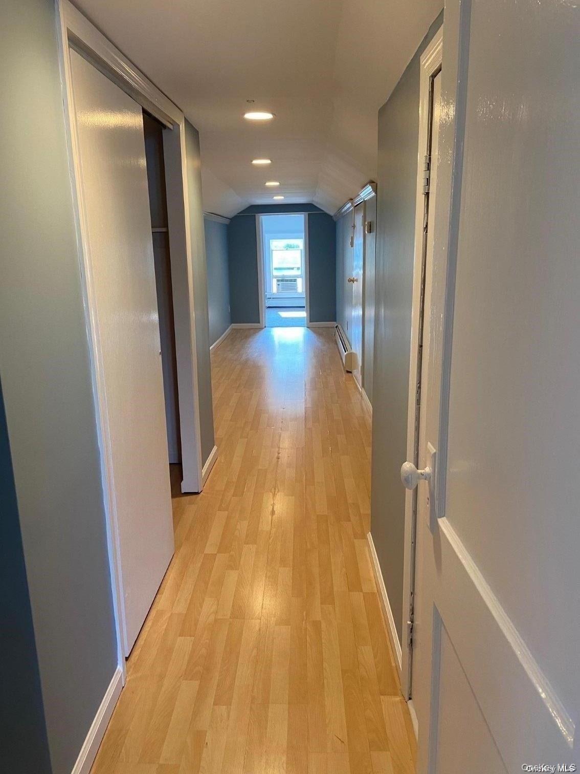 51 Centershore Road, Unit UPPR Centerport, NY 11721 - Photo 17 of 20 a view of gallery with wooden floor