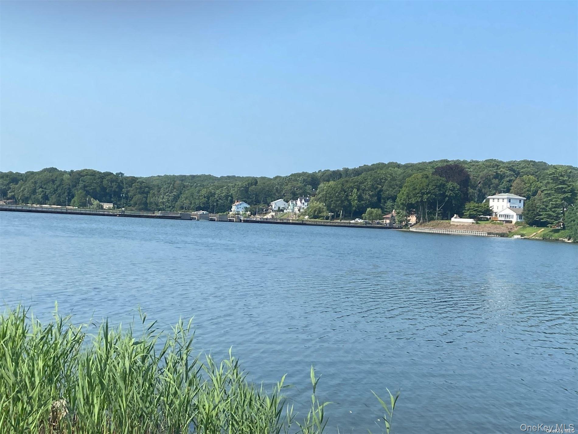 51 Centershore Road, Unit UPPR Centerport, NY 11721 - Photo 3 of 20 a view of lake and mountain