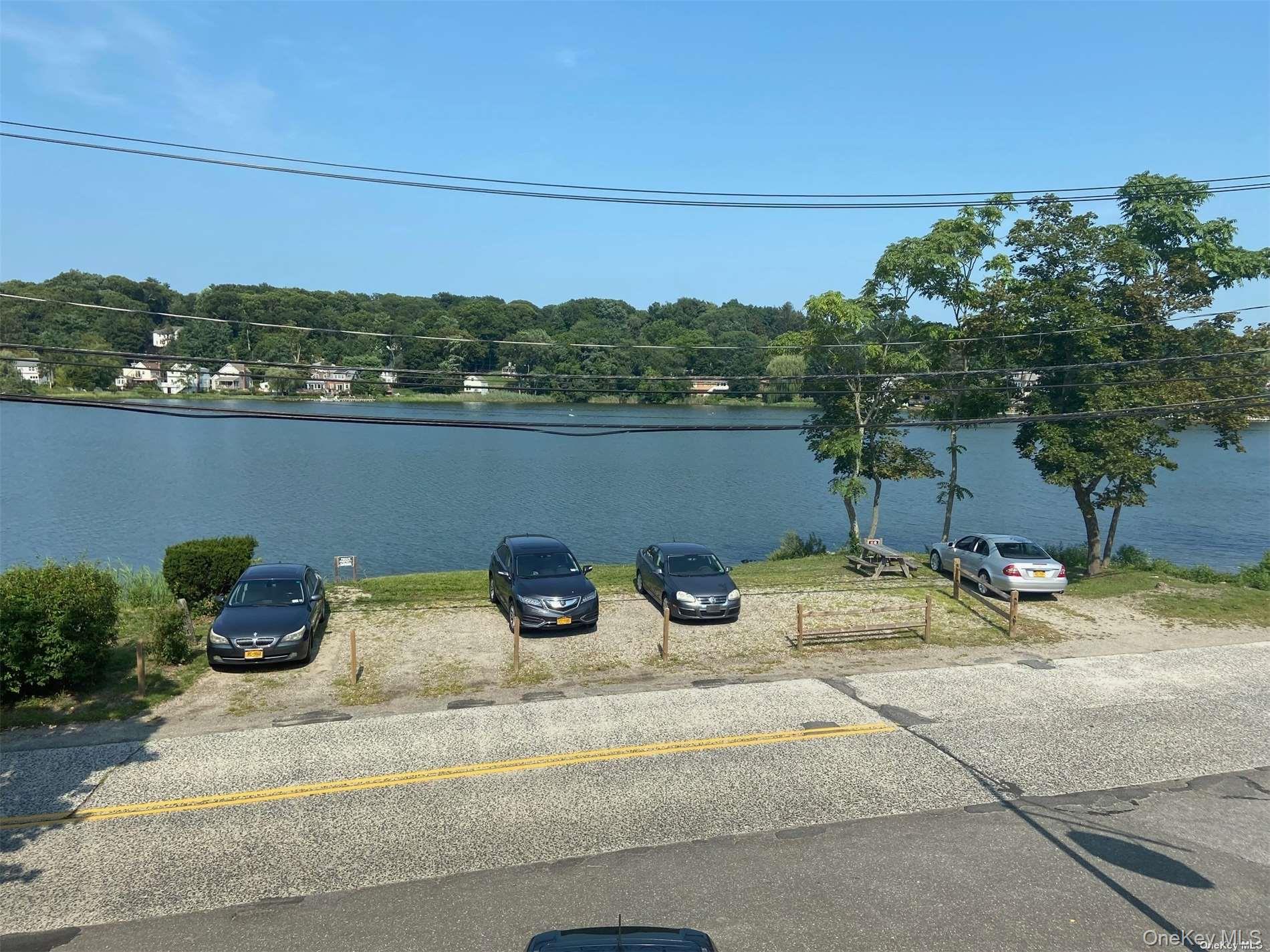 51 Centershore Road, Unit UPPR Centerport, NY 11721 - Photo 4 of 20 a view of a outdoor space with seating area
