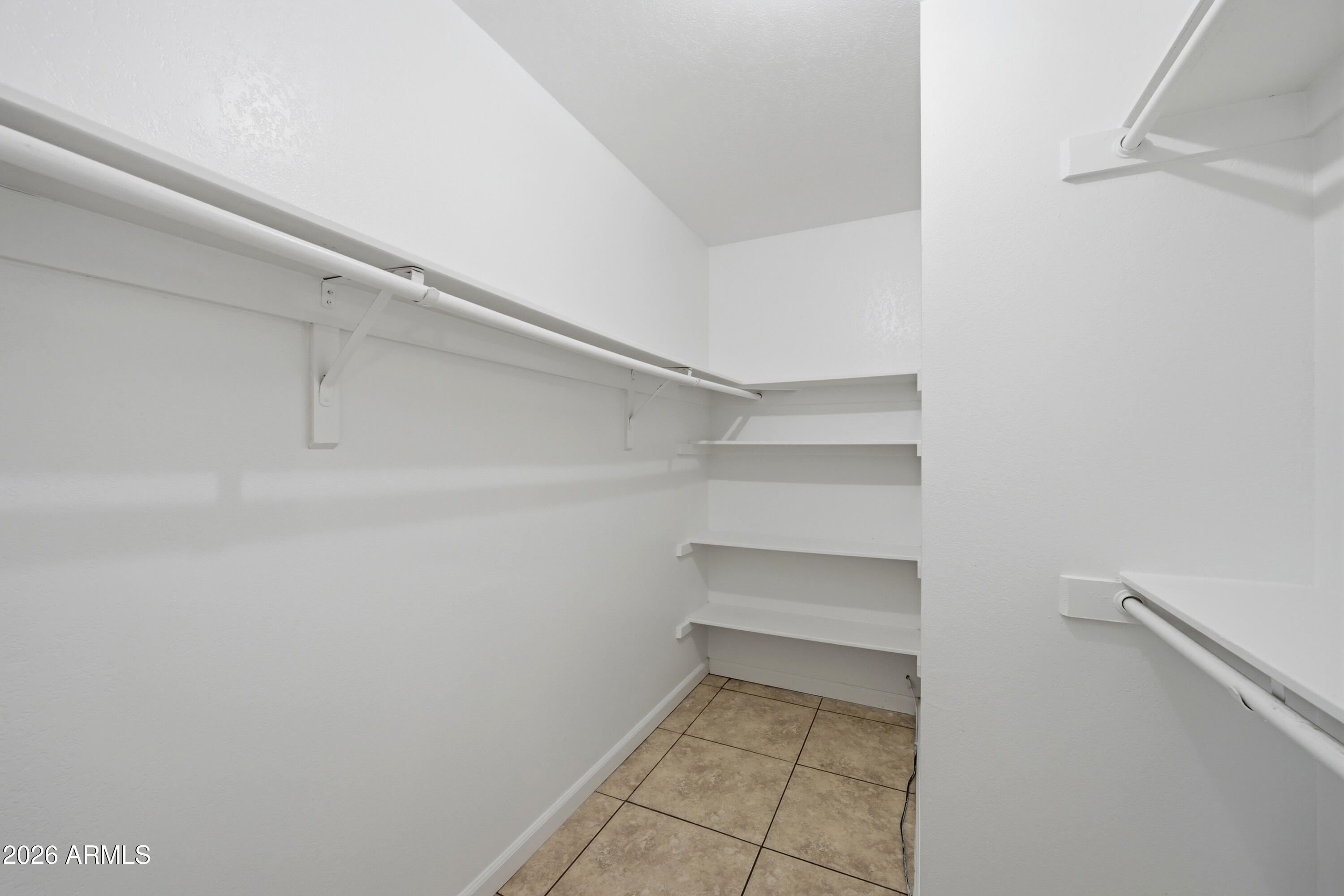 1651 East Apollo Road Phoenix, AZ 85042 - Photo 17 of 23 Walk-in Closet