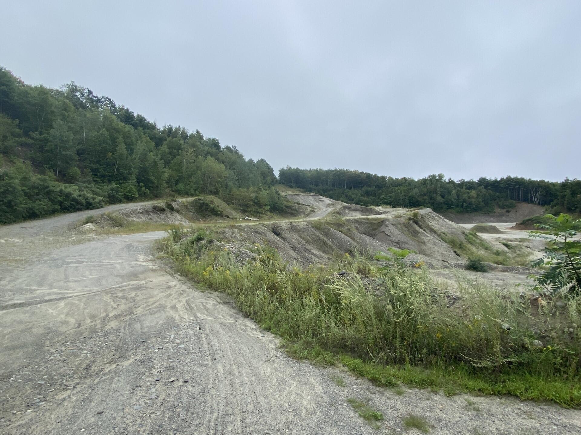 Lot 5 Horse Point Road Belgrade, ME 04917 - Photo 3 of 14 3-Old pit road with lots of material rem