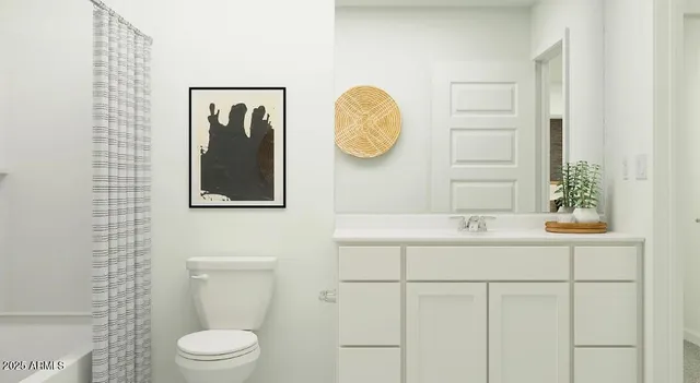 a bedroom with a bed and a view of bathroom