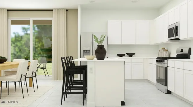 a picture of a room with a white wall and white cabinet