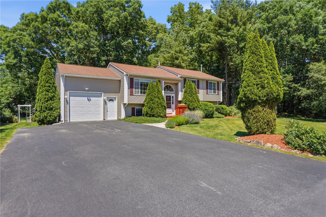 26 King Street Coventry, RI 02816 - Photo 3 of 50 Side with large driveway and garage