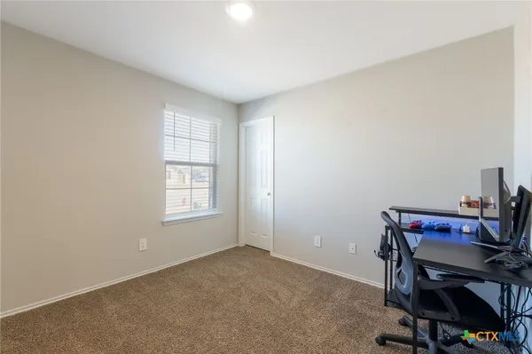 a view of workspace with a window