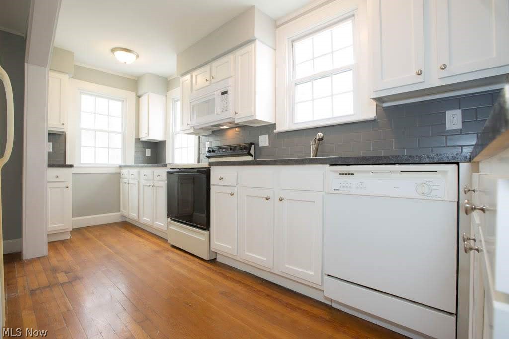 2496 Channing Road Cleveland, OH 44118 - Photo 3 of 35 Eat-in kitchen with hardwood floors and lots of counter and cupboard space