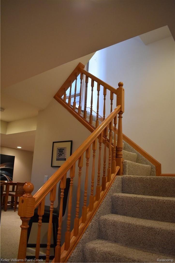 1993 Ridgefield Court Rochester, MI 48306 - Photo 39 of 47 THESE STAIRS LEAD FROM THE 1ST FLOOR TO THE LARGE FINISHED BASEMENT (855 SQ FT)