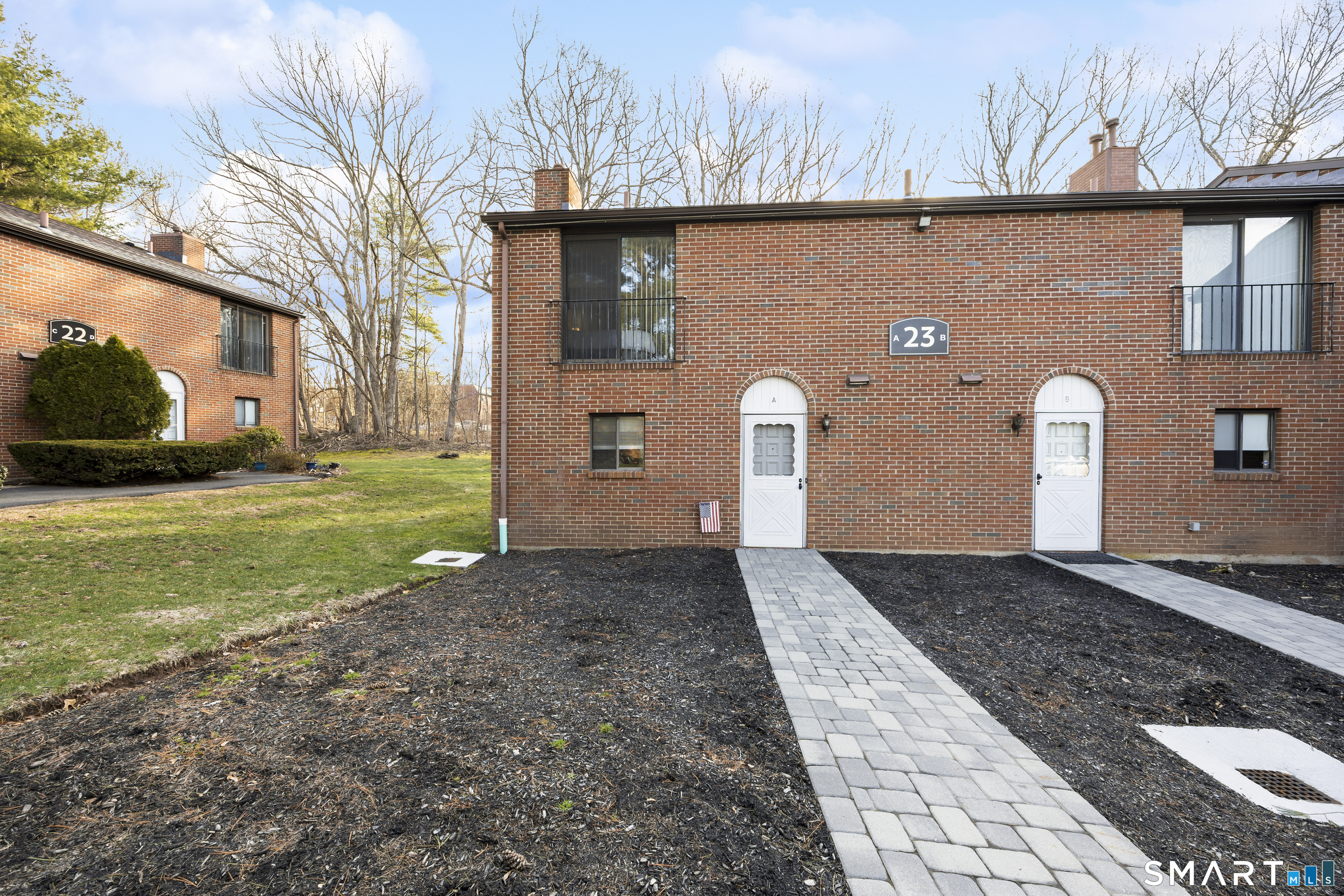 500 Darling Street, Unit 23A Southington, CT 06489 - Photo 1 of 1 a view of a back yard of the house