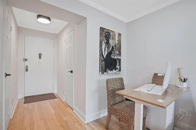 a view of a bathroom with a sink and a mirror