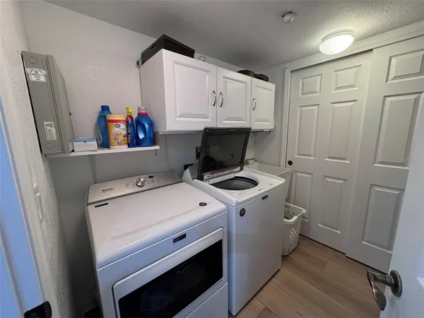 a view of a swimming pool with a yard