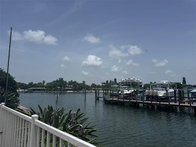 a view of a chairs and table in kitchen