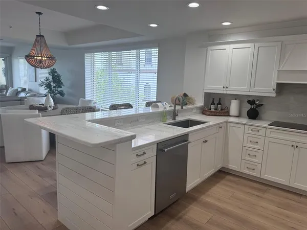 a room with a sink and a mirror