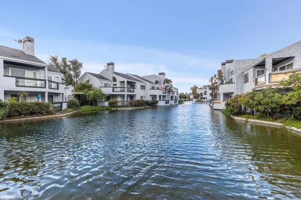 a view of a lake with houses