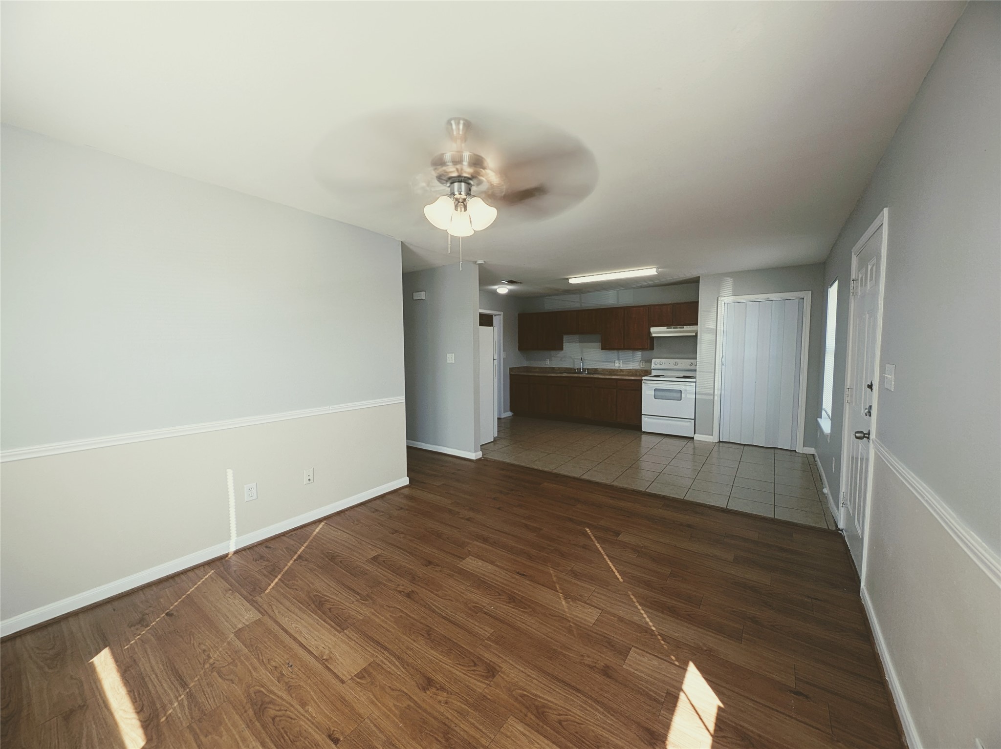 138 South Bend Court, Unit A Willis, TX 77378 - Photo 4 of 13 a view of empty room with wooden floor