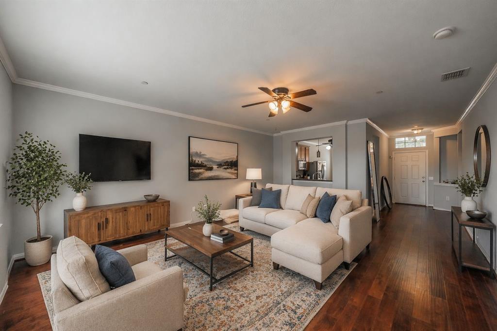 7253 Bianca Lane Plano, TX 75093 - Photo 2 of 18 a living room with furniture and a flat screen tv