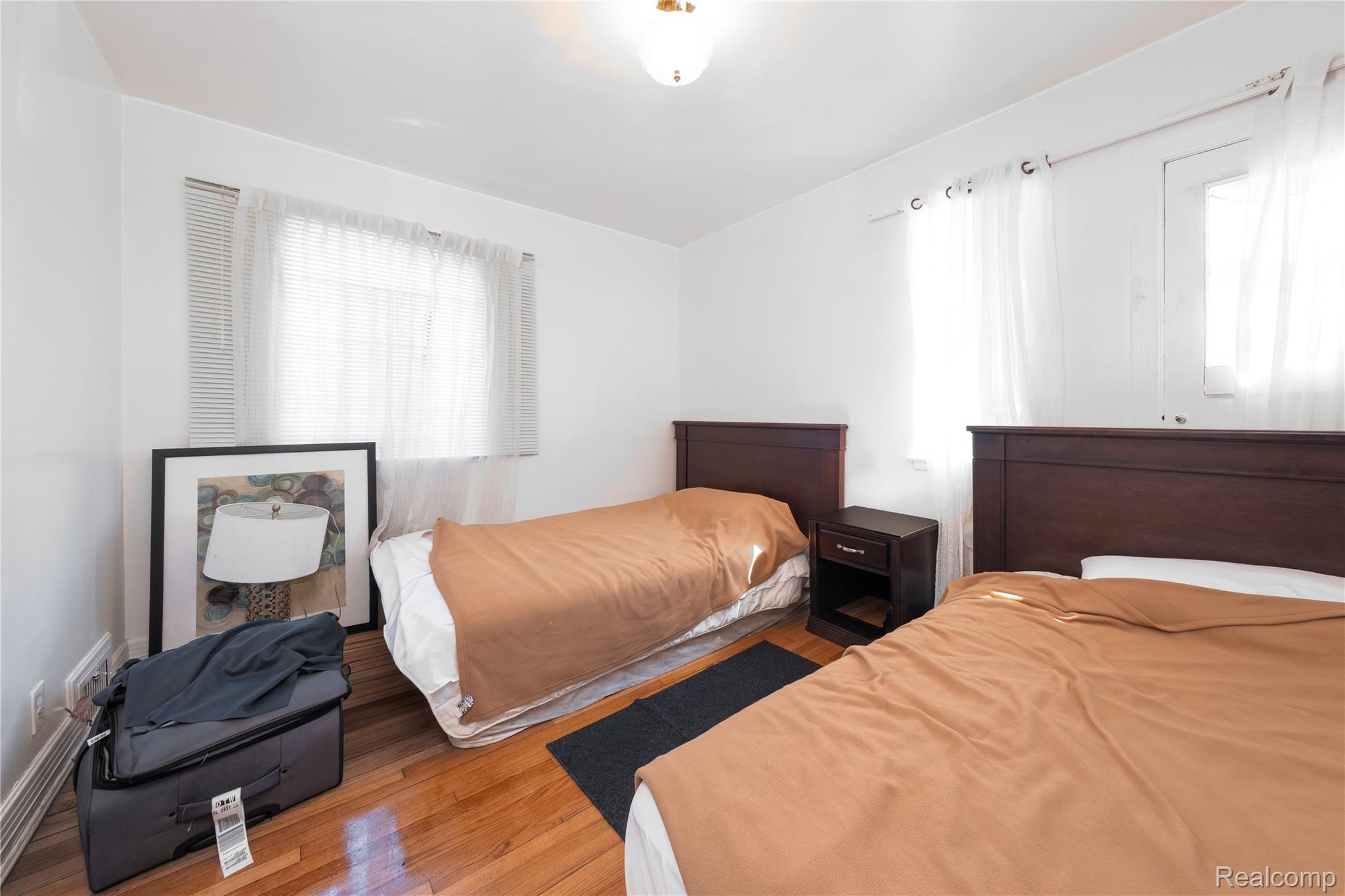 19970 Stratford Road Detroit, MI 48221 - Photo 6 of 27 Bedroom with wood finished floors