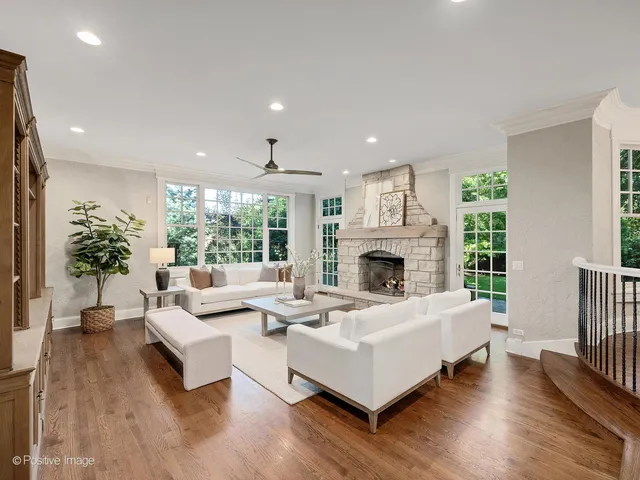a view of a dining room with a table and chairs