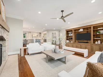 a large kitchen with stainless steel appliances granite countertop a large counter top and sink