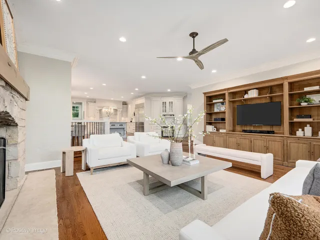 a large kitchen with stainless steel appliances granite countertop a large counter top and sink