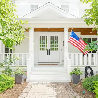 a front view of a house having patio