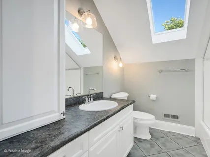 a view of a garden with a fountain