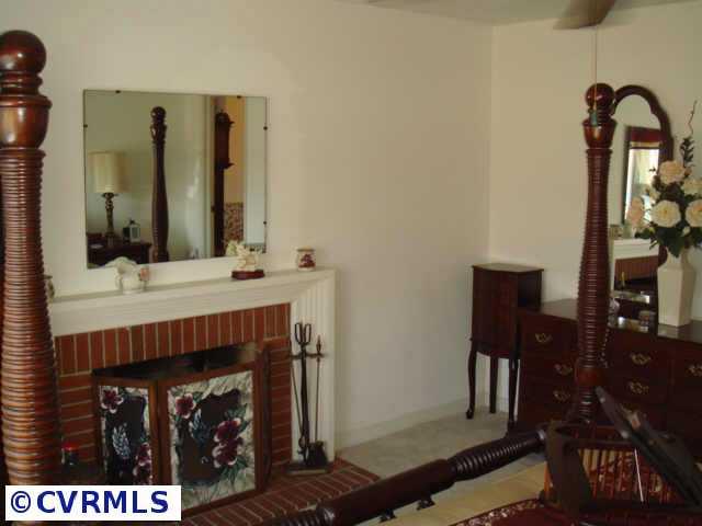 5428 Gilling Road Richmond, VA 23234 - Photo 7 of 10 Other - Master Room log burning all brick fireplace & could be Livingt Room.
