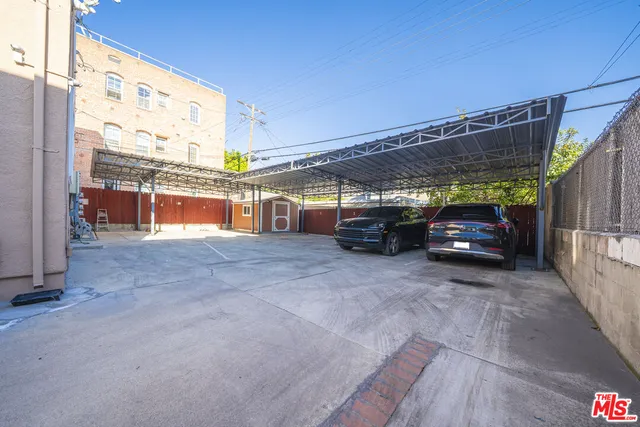 a view of a car parked in the parking lot