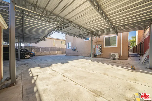 a view of a street with cars
