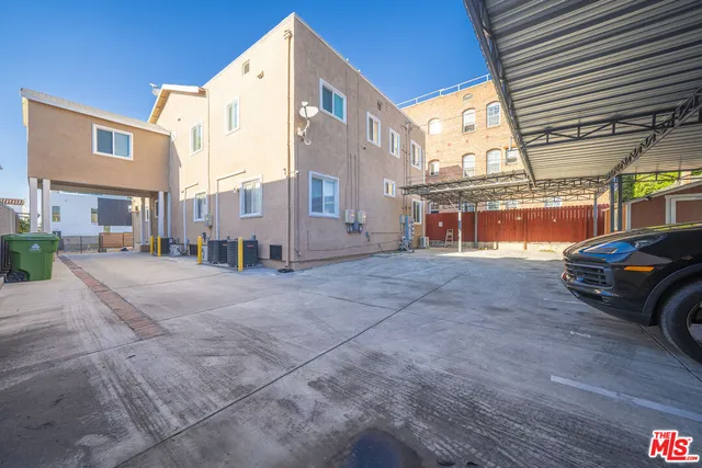 a aerial view of a house with a yard