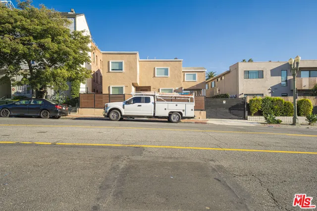 a view of a house with a street