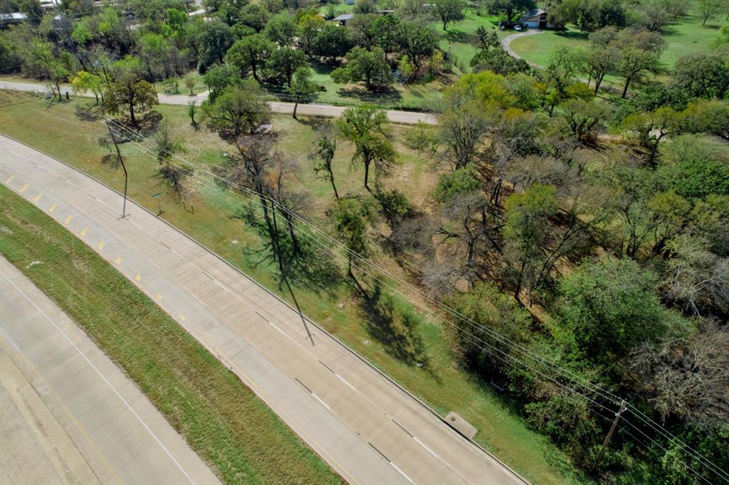 1716 Southeast Parkway Azle, TX 76020 - Photo 12 of 13 a view of a garden from a balcony