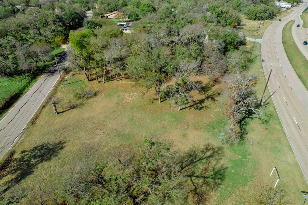 1716 Southeast Parkway Azle, TX 76020 - Photo 9 of 13 a view of a forest