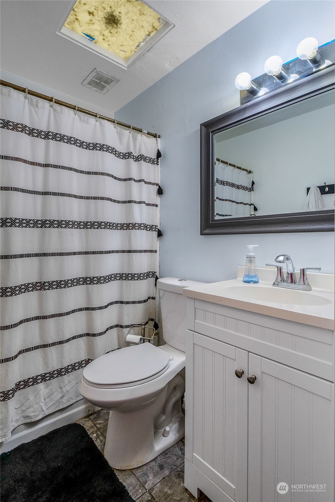 9012 B Bong Loop Moses Lake, WA 98837 - Photo 19 of 30 a bathroom with a toilet and a sink
