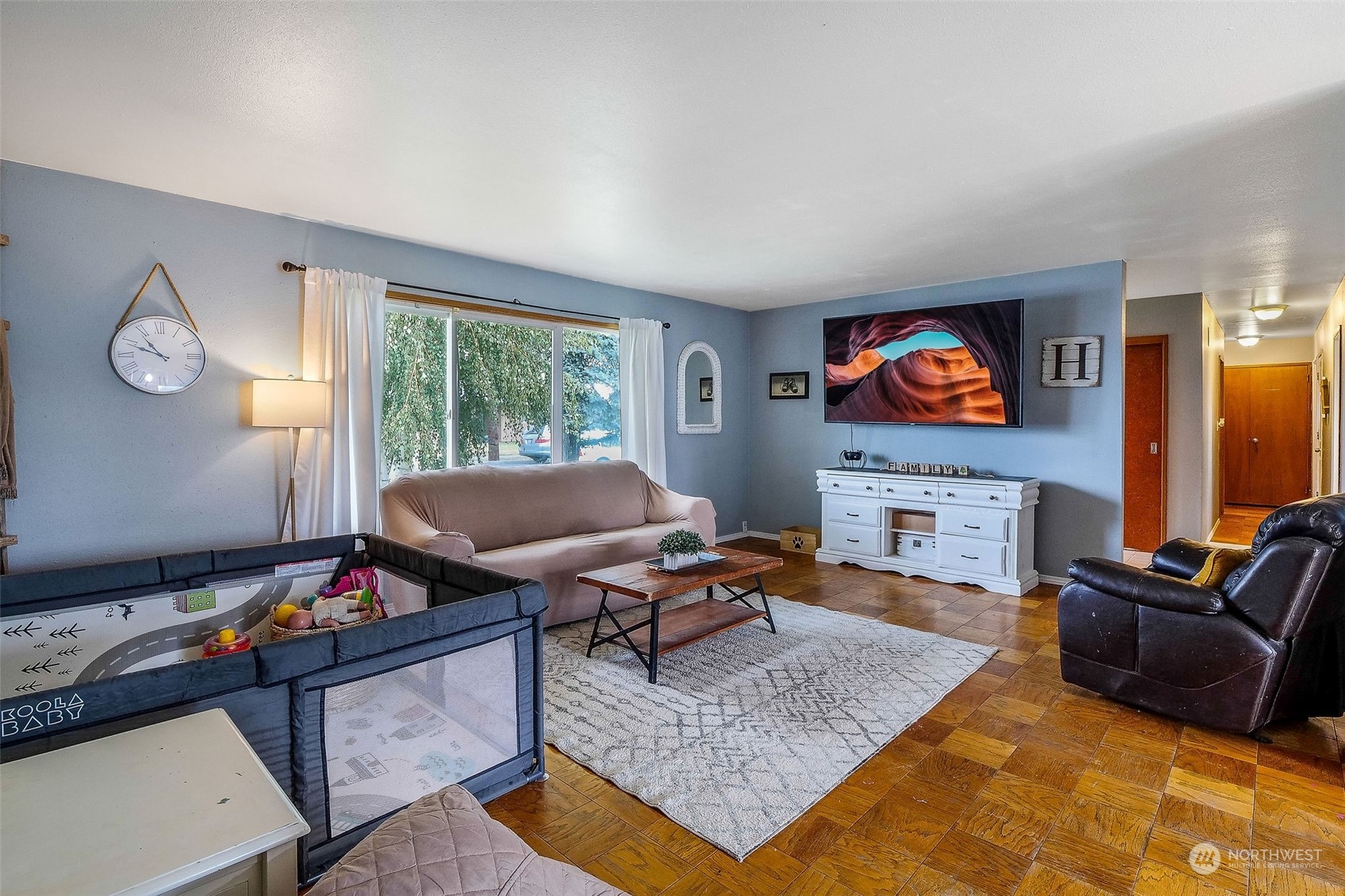 9012 B Bong Loop Moses Lake, WA 98837 - Photo 7 of 30 a living room with furniture and a flat screen tv