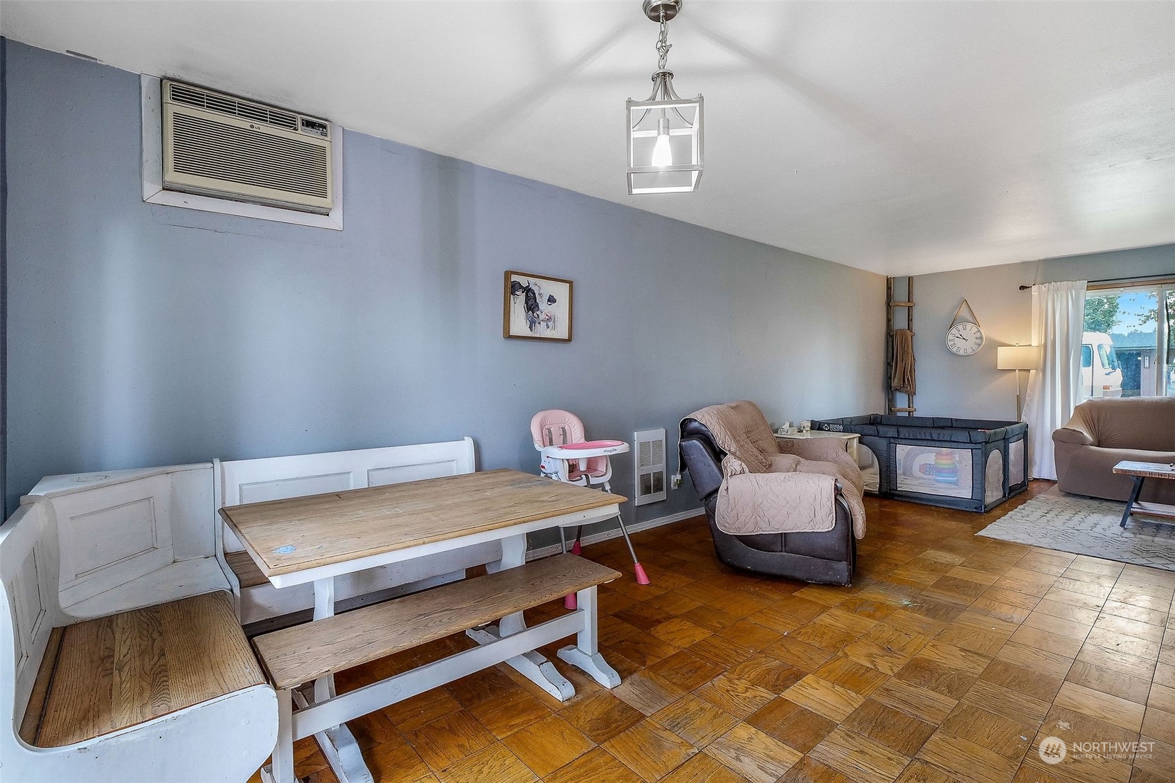 9012 B Bong Loop Moses Lake, WA 98837 - Photo 8 of 30 a bedroom with furniture and a chandelier