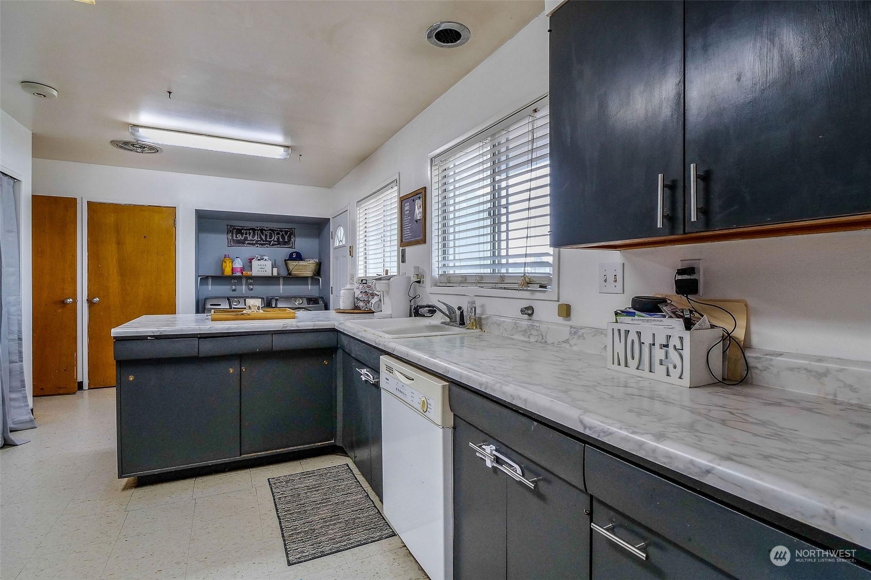 9012 B Bong Loop Moses Lake, WA 98837 - Photo 10 of 30 a kitchen with sink cabinets and window