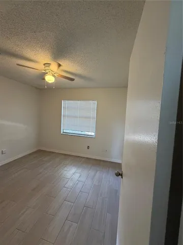 an empty room with a bathroom