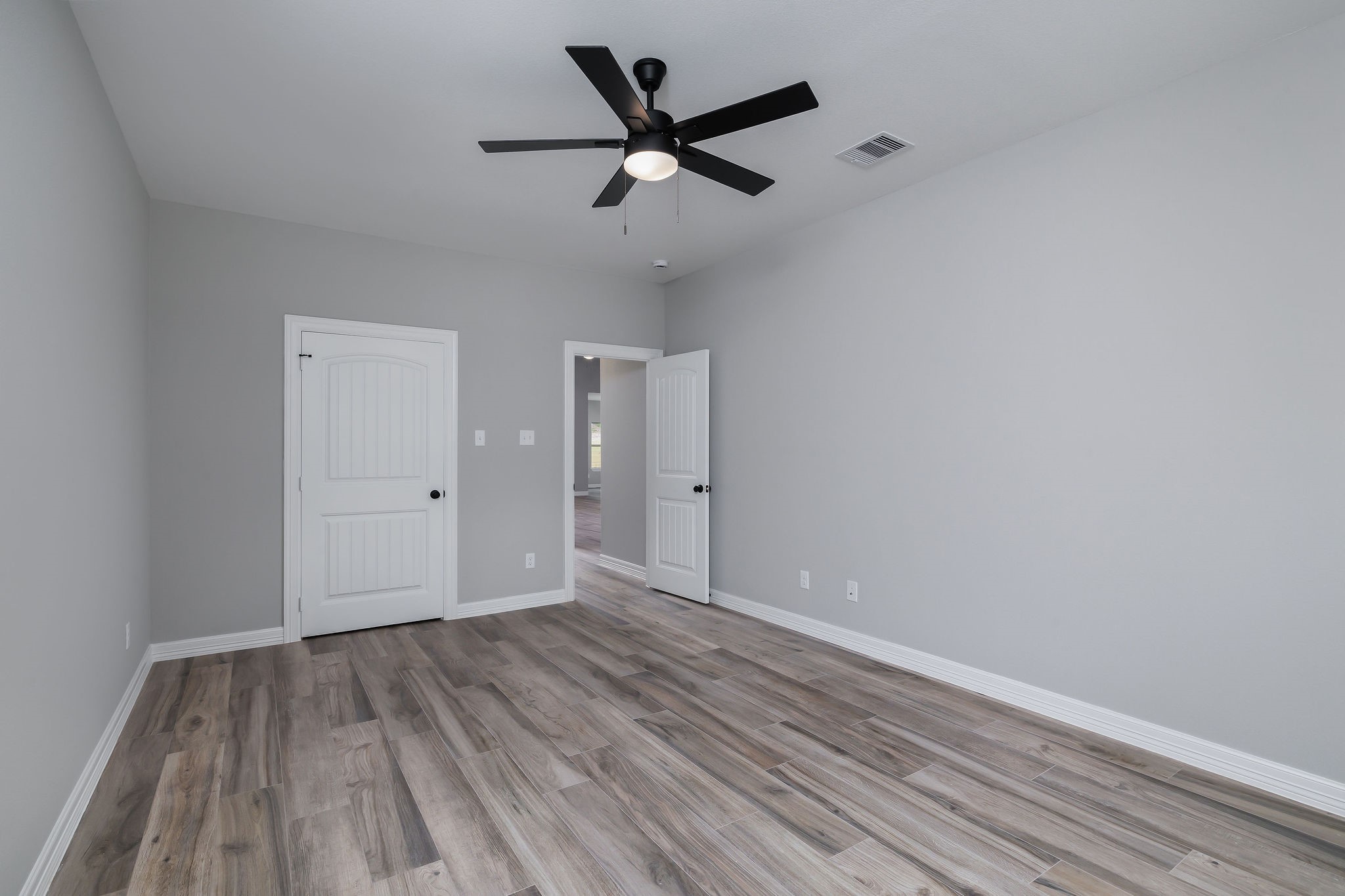 364 Dahlia Road Huntsville, TX 77320 - Photo 27 of 34 wooden floor in an empty room