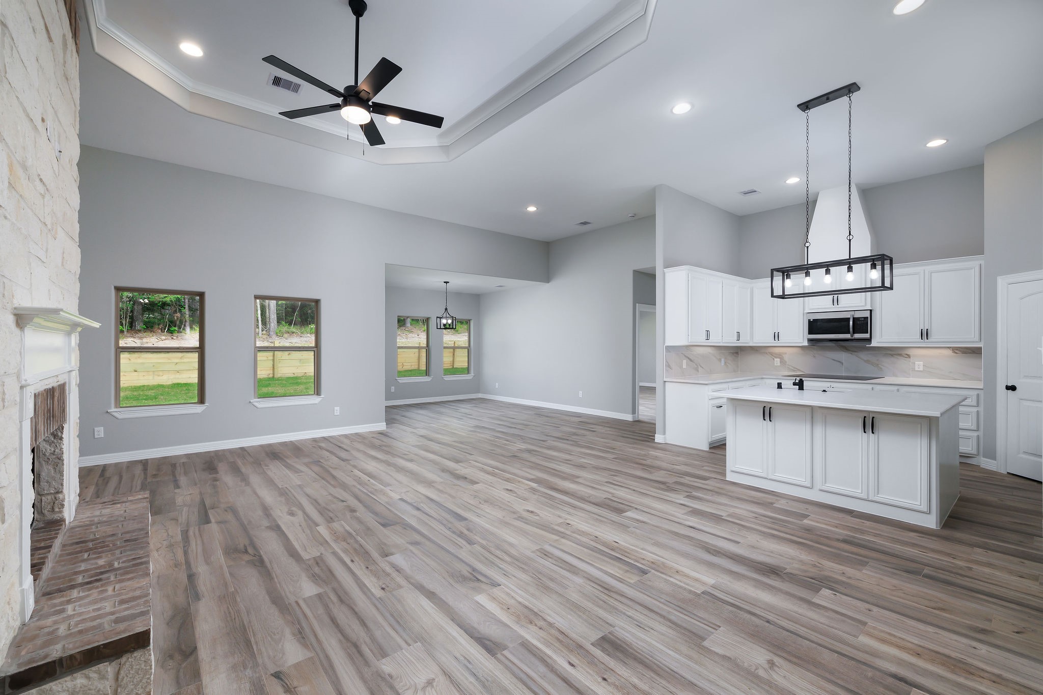 364 Dahlia Road Huntsville, TX 77320 - Photo 9 of 34 a view of kitchen with sink microwave and refrigerator