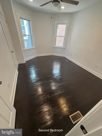 en empty room with windows