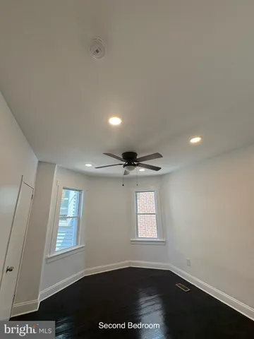 en empty room with windows