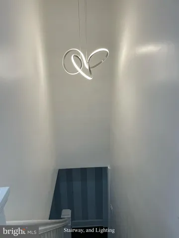 a view of a door and a fan