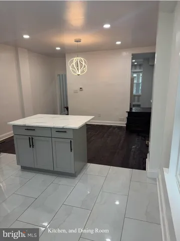 a room with a table and chairs