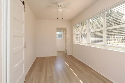 a view of a backyard with pathway