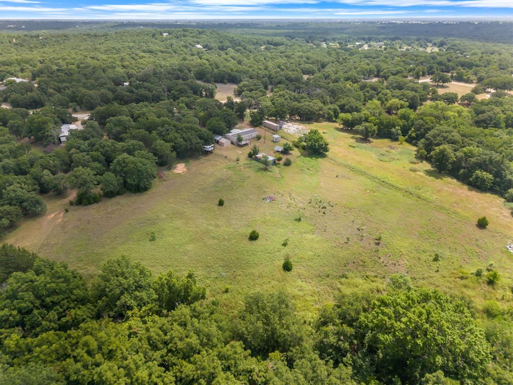 439 Slayden Road Sunset, TX 76270 - Photo 25 of 27 Expansive acreage featuring a combination of wooded and open land